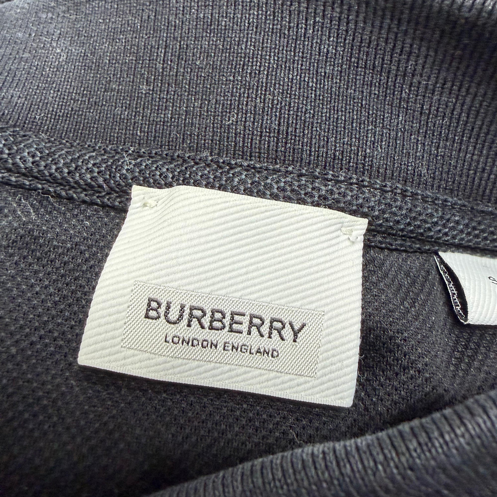 Burberry Luckland Logo Print Polo in Black Cotton